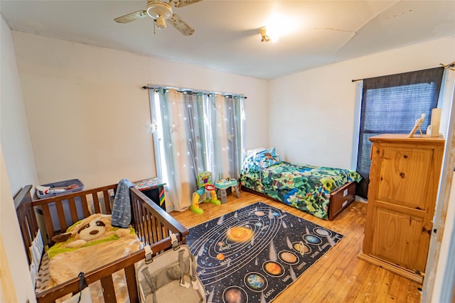 bedroom featuring hardwood / wood-style flooring