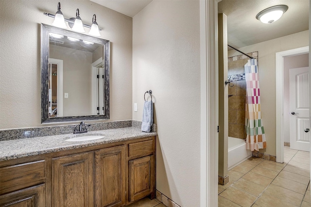 full bathroom featuring tile patterned floors, shower / bath combination with curtain, and vanity