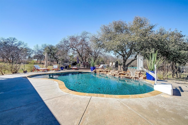 view of pool featuring a fenced in pool, a patio, and fence