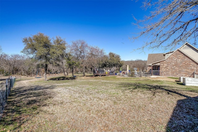 view of yard featuring fence