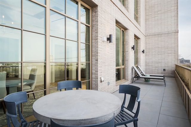 balcony with outdoor dining area
