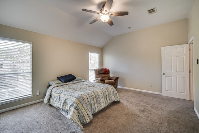 bedroom with carpet, visible vents, vaulted ceiling, ceiling fan, and baseboards