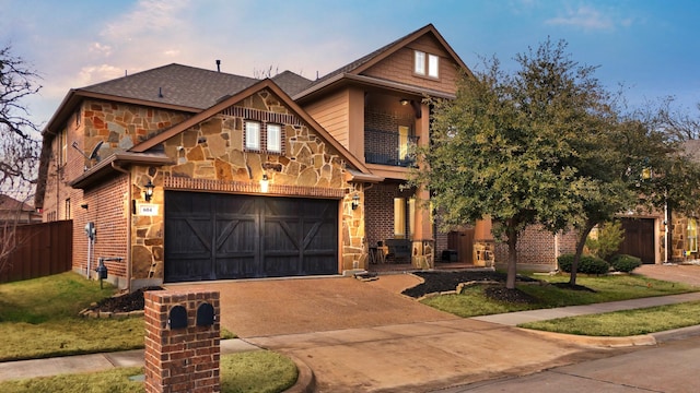 view of front of property with a garage