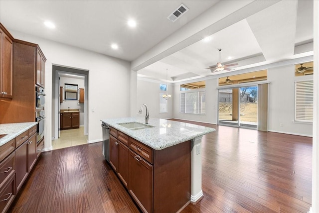 9525 Crestview Dr, Denton, TX 76207 - kitchen with a sink, stainless steel dishwasher, dark wood-type flooring, open floor plan, and recessed lighting