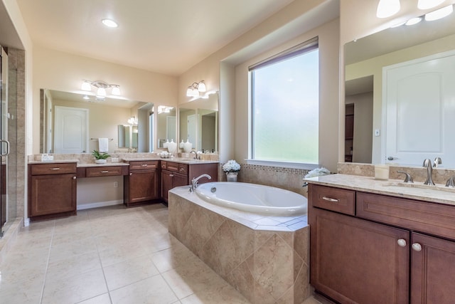 9525 Crestview Dr, Denton, TX 76207 - bathroom with a shower stall, a garden tub, two vanities, and tile patterned flooring