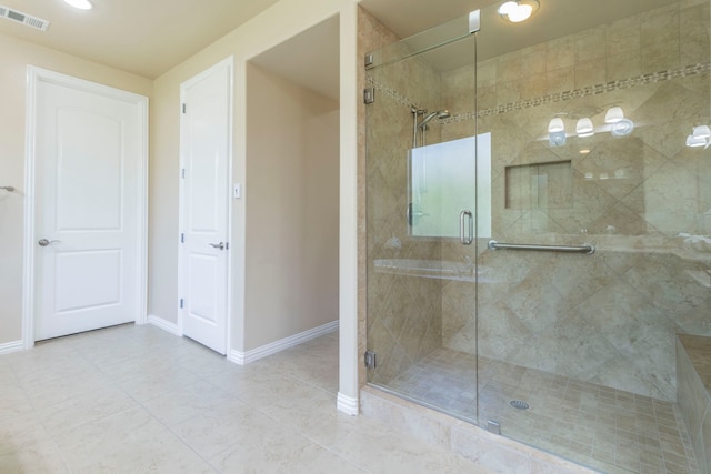 9525 Crestview Dr, Denton, TX 76207 - bathroom with a stall shower, baseboards, and tile patterned floors