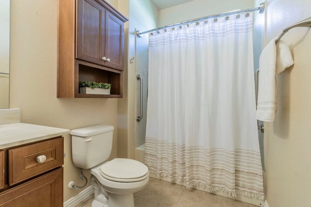 9525 Crestview Dr, Denton, TX 76207 - bathroom with shower / tub combo, toilet, vanity, tile patterned flooring, and baseboards