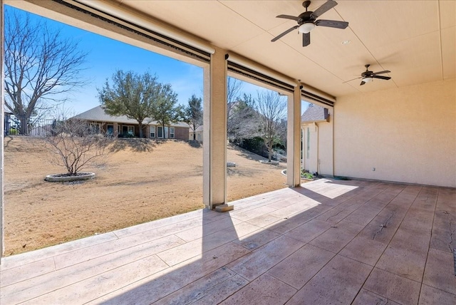 view of patio with ceiling fan