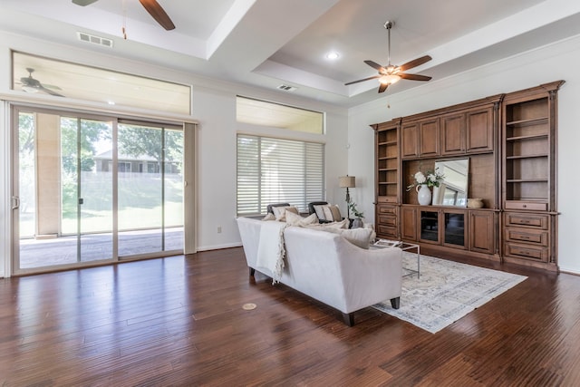 9525 Crestview Dr, Denton, TX 76207 - living room featuring ceiling fan, dark wood finished floors, a raised ceiling, ornamental molding, and recessed lighting