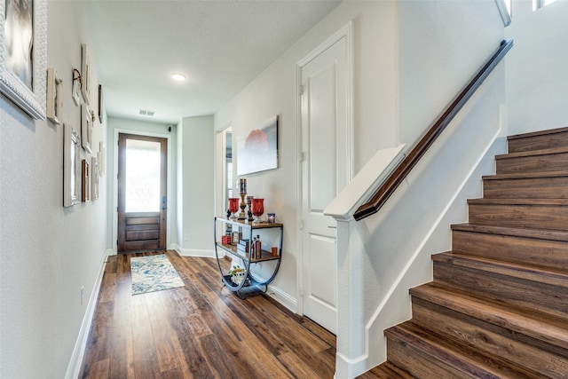 entryway featuring dark wood-type flooring