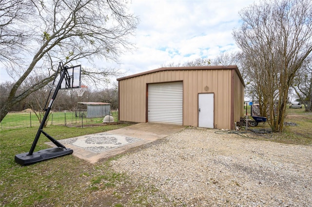 garage with a yard
