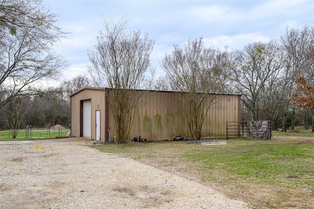 view of outbuilding featuring a garage