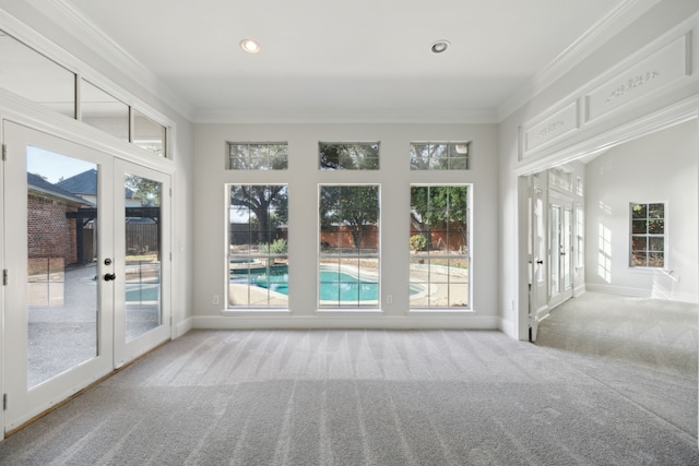 unfurnished sunroom with french doors