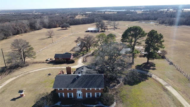 birds eye view of property with a rural view