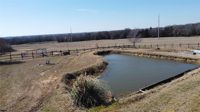 view of water feature with a rural view