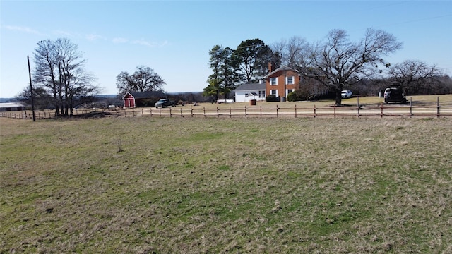 view of yard featuring a rural view