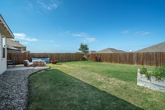 view of yard featuring an outdoor living space and a patio