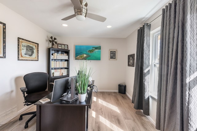 office featuring ceiling fan and light wood-type flooring