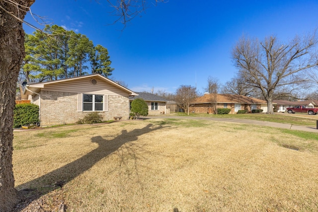 exterior space with a front yard