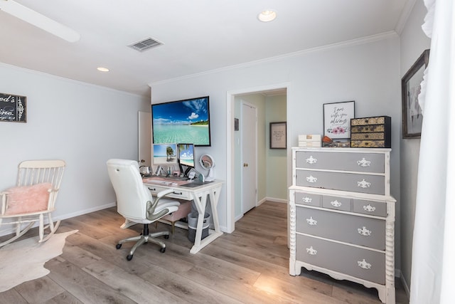 office with crown molding and hardwood / wood-style flooring