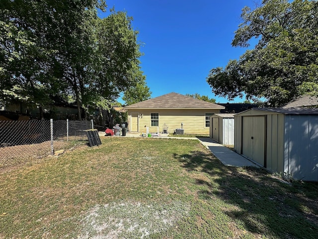 view of yard featuring a patio area and a storage unit