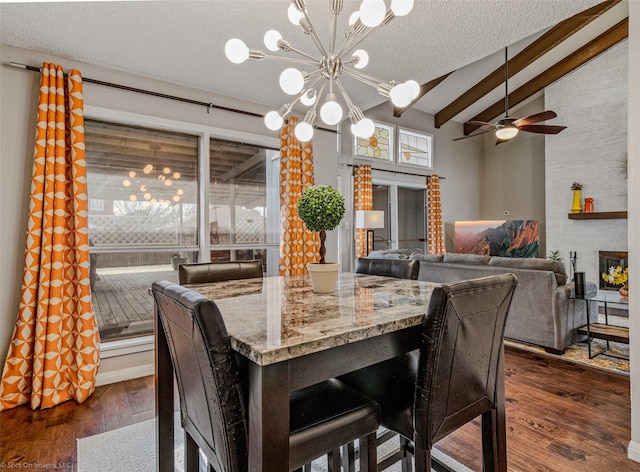 kitchen featuring stainless steel dishwasher, a sink, light tile patterned floors, stone countertops, and backsplash
