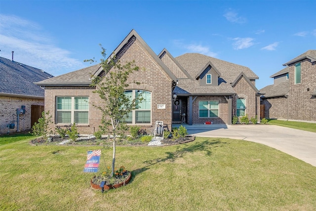 view of front of home with a front lawn