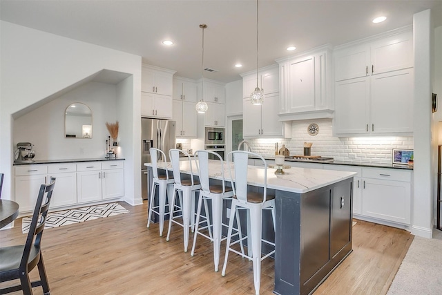 517 Ramon St, Burleson, TX 76028 - dining space featuring visible vents, recessed lighting, light wood-style floors, and ceiling fan with notable chandelier