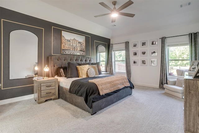 517 Ramon St, Burleson, TX 76028 - bedroom with light colored carpet, arched walkways, and a ceiling fan