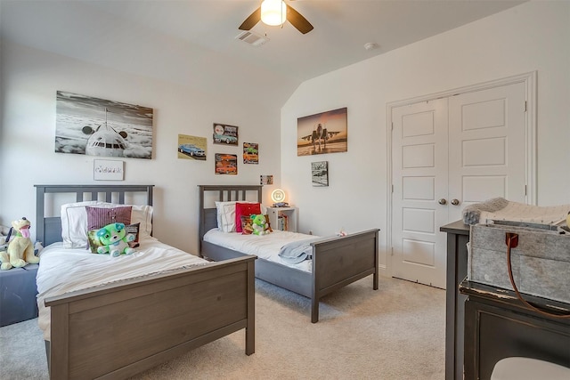 517 Ramon St, Burleson, TX 76028 - bedroom with light colored carpet, vaulted ceiling, a closet, and a ceiling fan