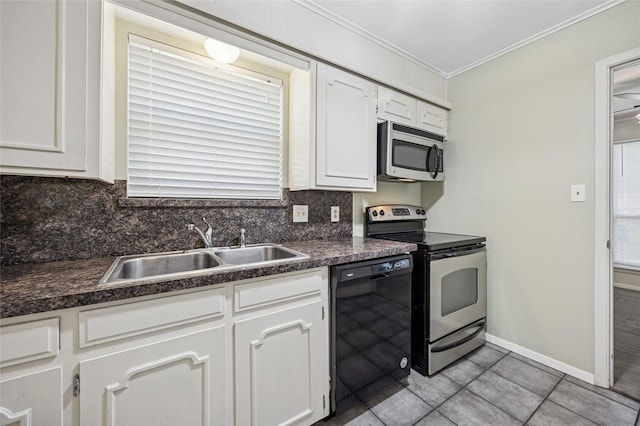7316 Martha Ln, Fort Worth, TX 76112 - kitchen with stainless steel appliances, dark countertops, a sink, white cabinets, and decorative backsplash