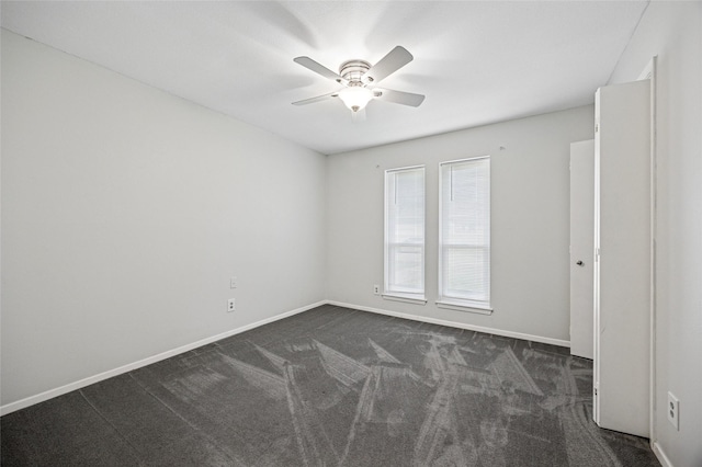 7316 Martha Ln, Fort Worth, TX 76112 - spare room with ceiling fan, dark carpet, and baseboards