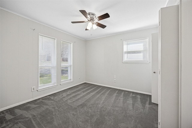 7316 Martha Ln, Fort Worth, TX 76112 - empty room with dark colored carpet, ornamental molding, a ceiling fan, and baseboards