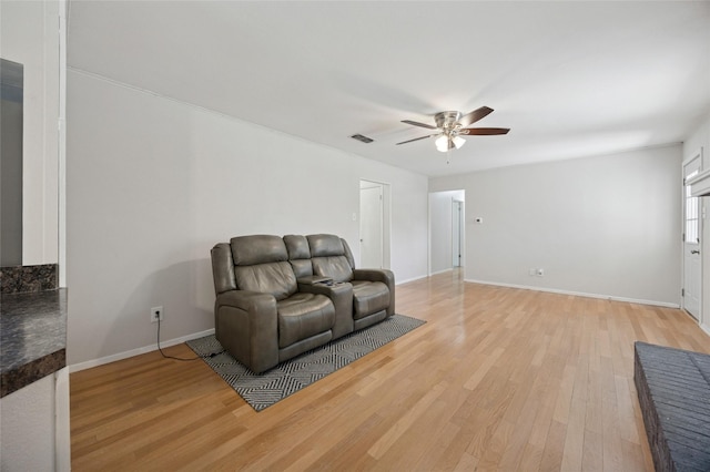 7316 Martha Ln, Fort Worth, TX 76112 - sitting room featuring a ceiling fan, light wood-type flooring, and baseboards