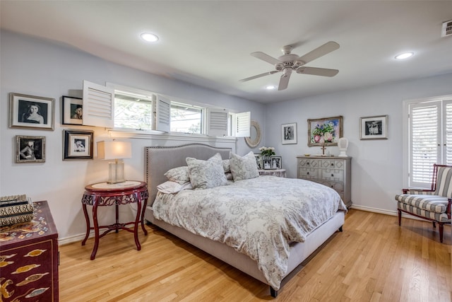 bedroom featuring ceiling fan and light hardwood / wood-style floors