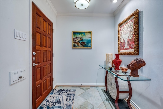 foyer entrance featuring ornamental molding