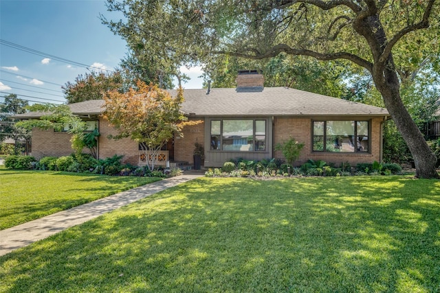 view of front of home with a front yard