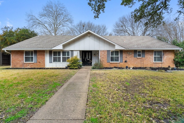 ranch-style house with a front yard