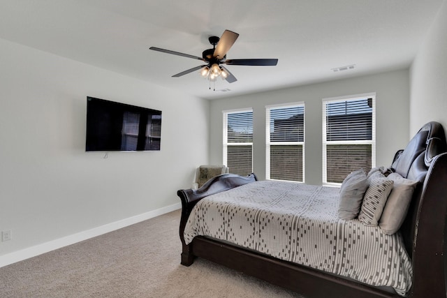 2770 Fireside Dr, Midlothian, TX 76065 - carpeted bedroom featuring multiple windows, baseboards, and ceiling fan