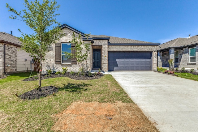 3917 Belleview Pl, Crandall, TX 75114 - view of front of property with an attached garage, a front lawn, driveway, and brick siding