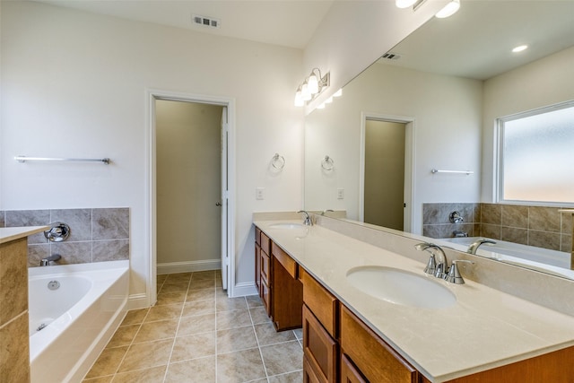 3917 Belleview Pl, Crandall, TX 75114 - bathroom with a garden tub, a sink, visible vents, and double vanity