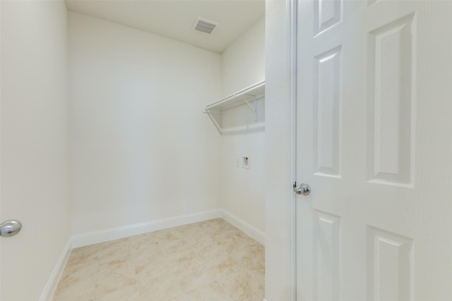 3917 Belleview Pl, Crandall, TX 75114 - laundry room featuring baseboards, visible vents, hookup for a washing machine, and laundry area
