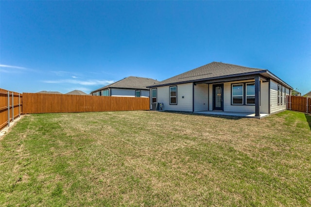 3917 Belleview Pl, Crandall, TX 75114 - back of property with a yard, central air condition unit, a patio, and a fenced backyard