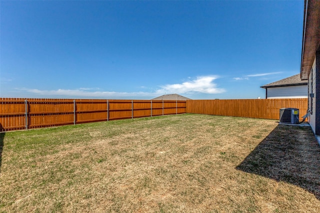 3917 Belleview Pl, Crandall, TX 75114 - view of yard with central AC and a fenced backyard
