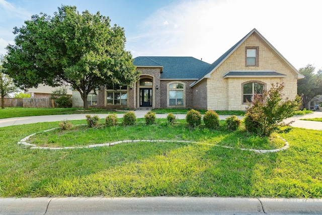 view of front of house with a front lawn