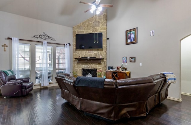 living room with a fireplace, high vaulted ceiling, dark hardwood / wood-style floors, and ceiling fan