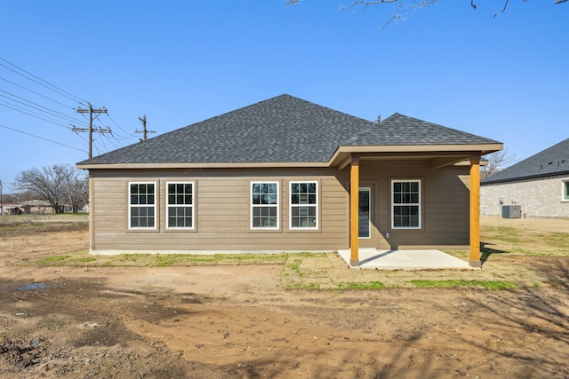 back of house featuring a patio and cooling unit