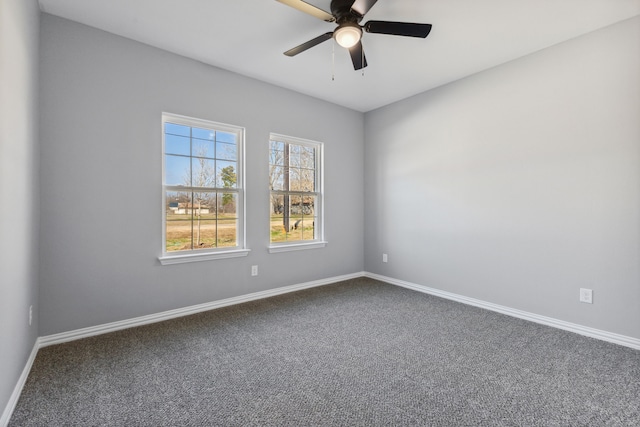 empty room featuring carpet and ceiling fan