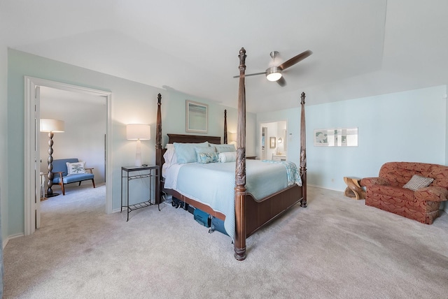 bedroom with light carpet and a ceiling fan