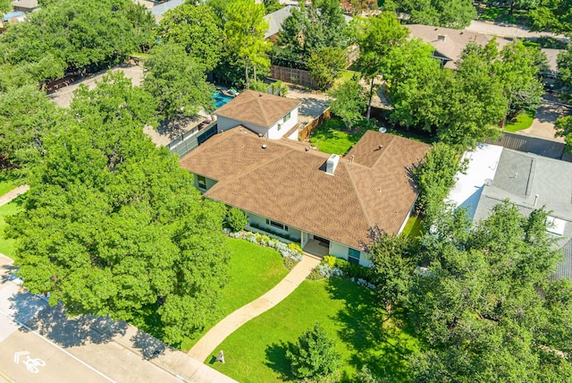 birds eye view of property with a residential view